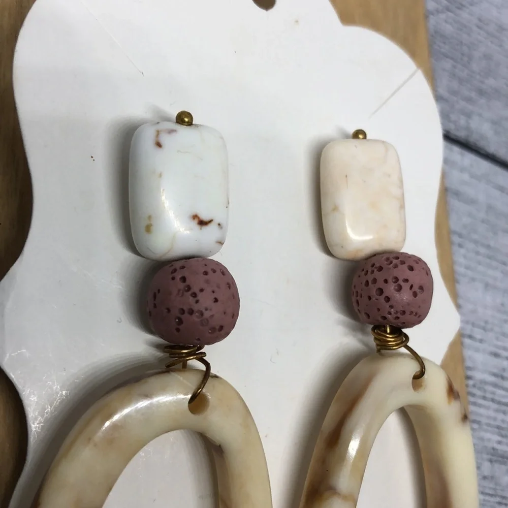 Handcrafted handmade statement style boho earrings long dangle drop.